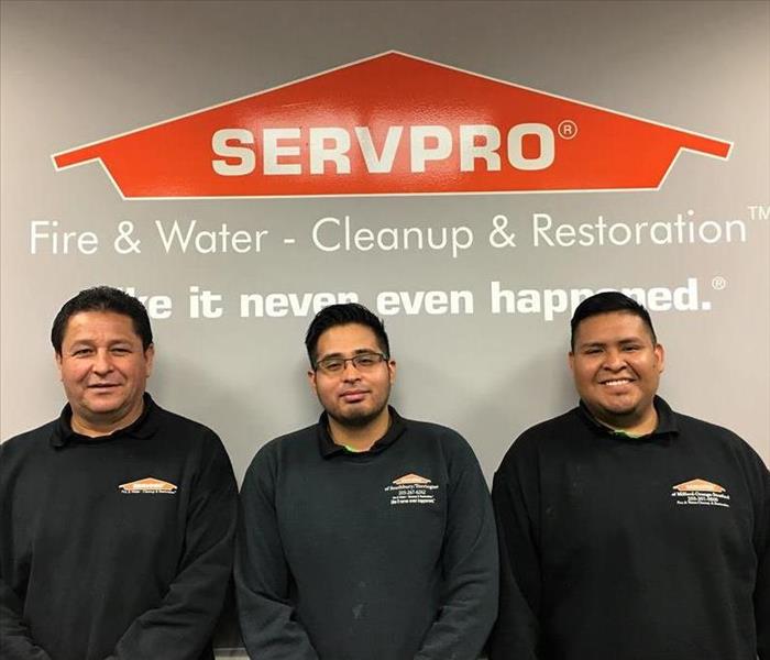 3 men standing side by side in servpro shirts
